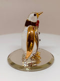 Playful Glass Penguin Figurine Handcrafted with Gold Accents