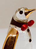 Playful Glass Penguin Figurine Handcrafted with Gold Accents