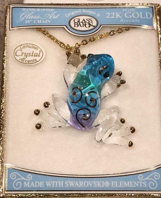 Handcrafted blue glass frog necklace with gold accents on 18 inch gold plated chain