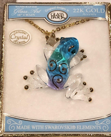Handcrafted blue glass frog necklace with gold accents on 18 inch gold plated chain