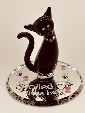 Handcrafted black cat glass figurine with crystal accents on beveled mirror and Spoiled Cat lives here message
