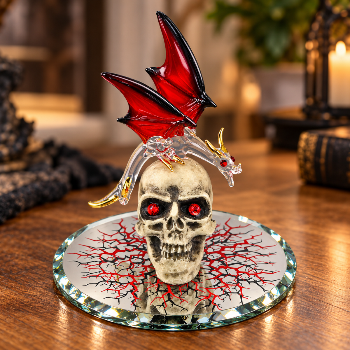 Handcrafted red-winged dragon perched on a skull with red crystal eyes, mounted on a beveled glass mirror with a red and black cracked pattern