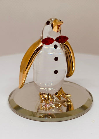 Playful Glass Penguin Figurine Handcrafted with Gold Accents