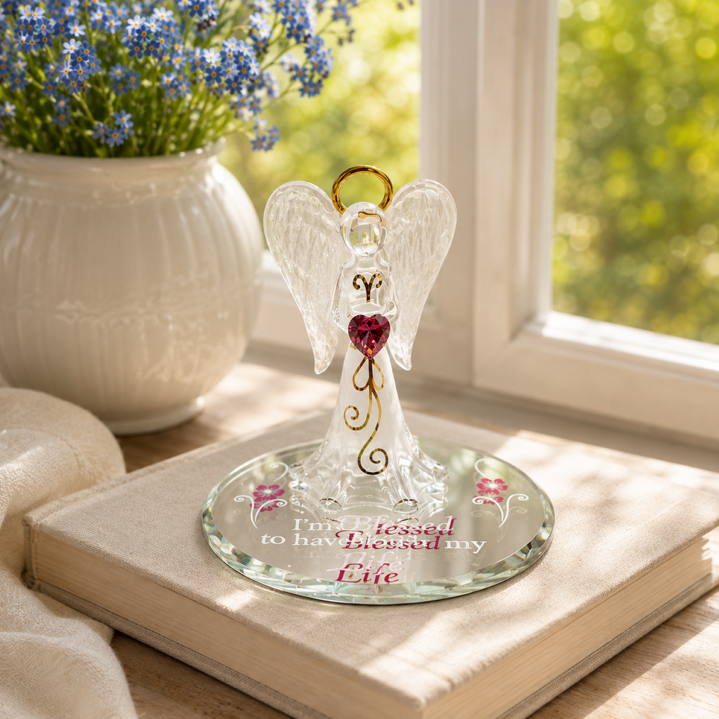 Handcrafted glass angel figurine holding a crystal heart on a beveled glass mirror engraved with "I'm Blessed to have you in my Life" with genuine crystals and gold accents.