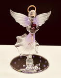 Angel of Faith glass figurine holding purple crystal heart