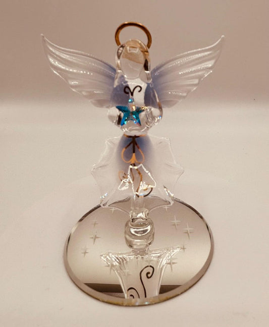 Handcrafted glass angel holding a star with crystal and 22Kt gold accents on a beveled mirror