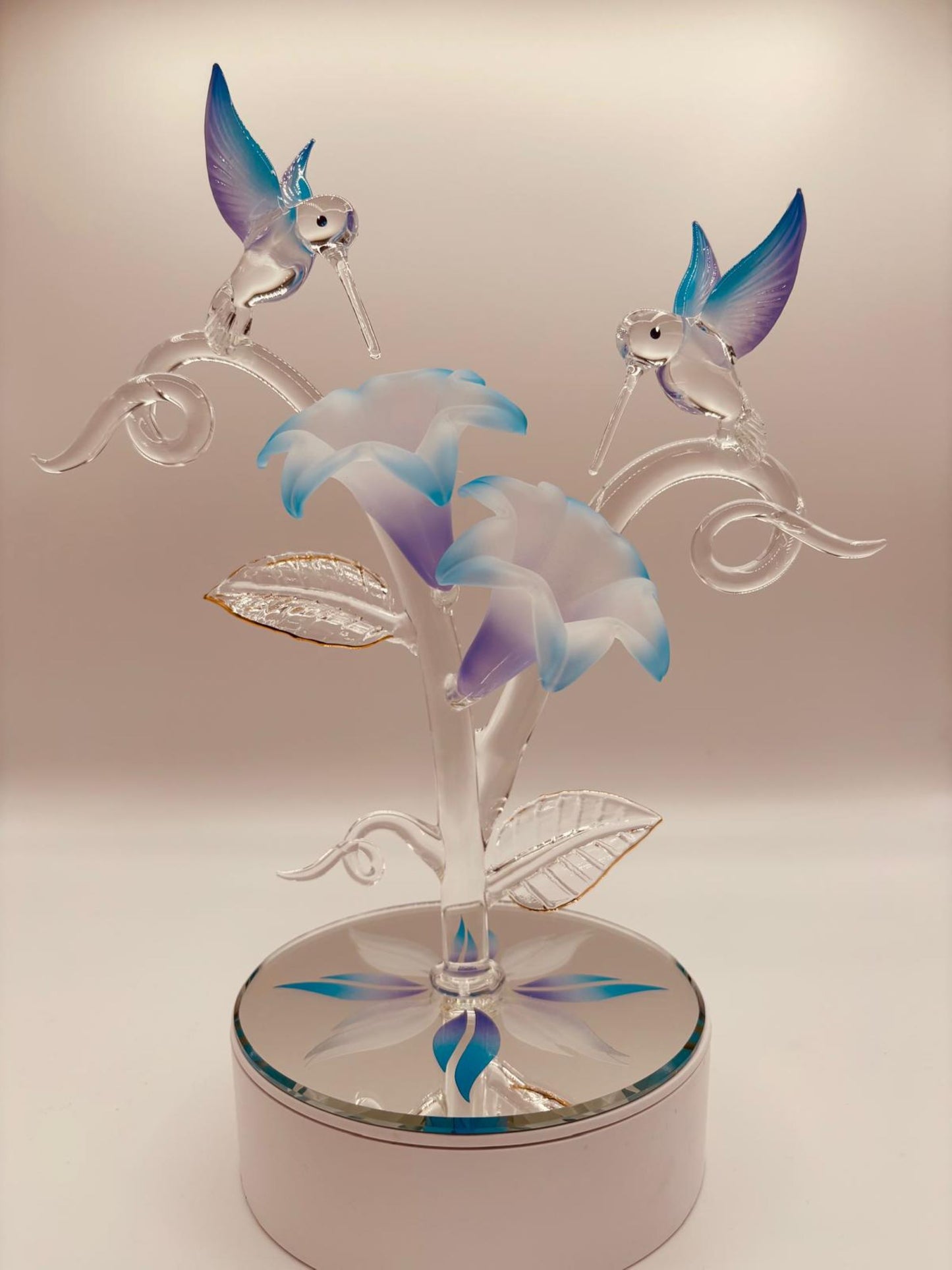 Hummingbirds on floral branch glass figurine with lilies and vines