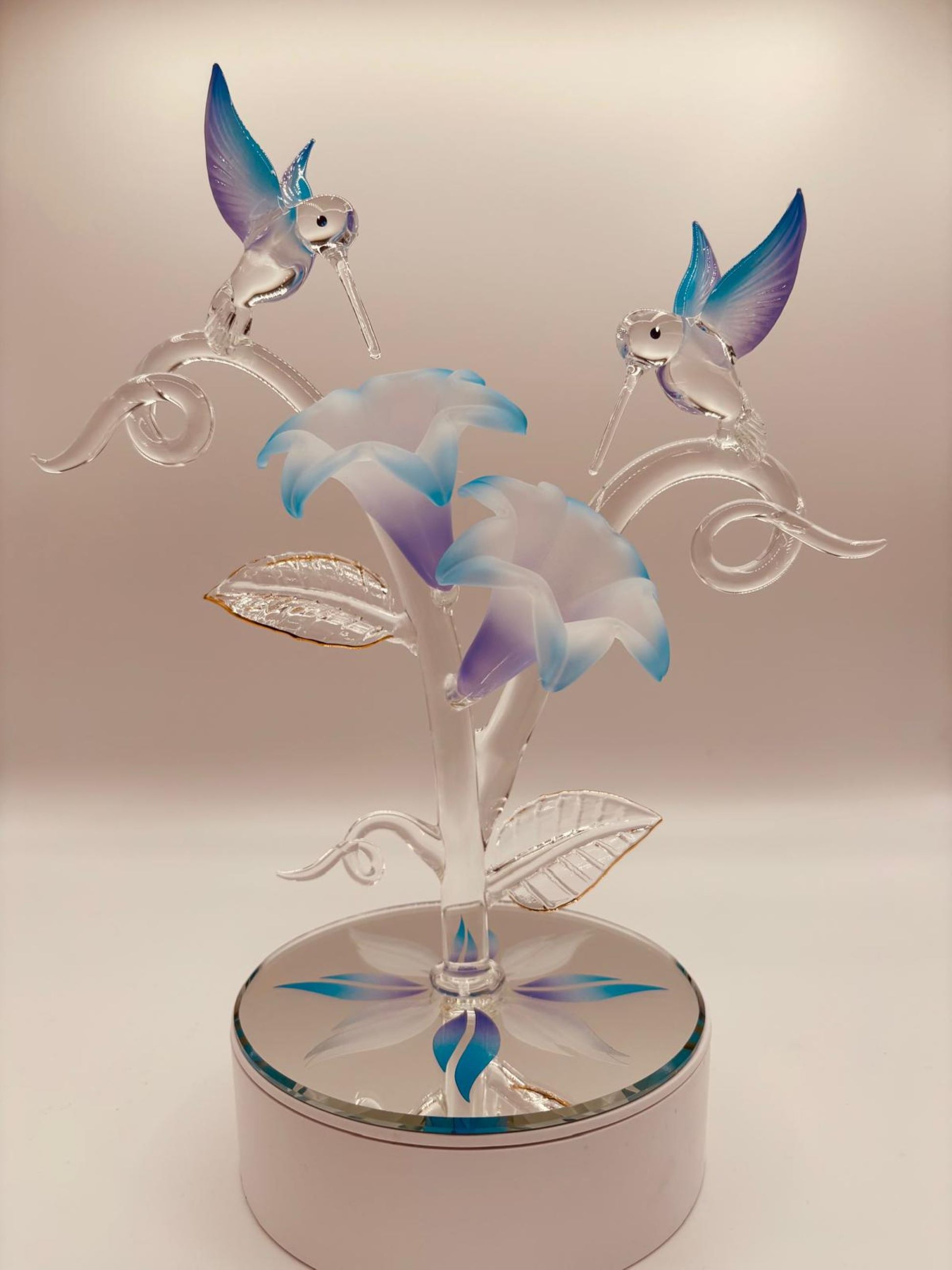 Hummingbirds on floral branch glass figurine with lilies and vines