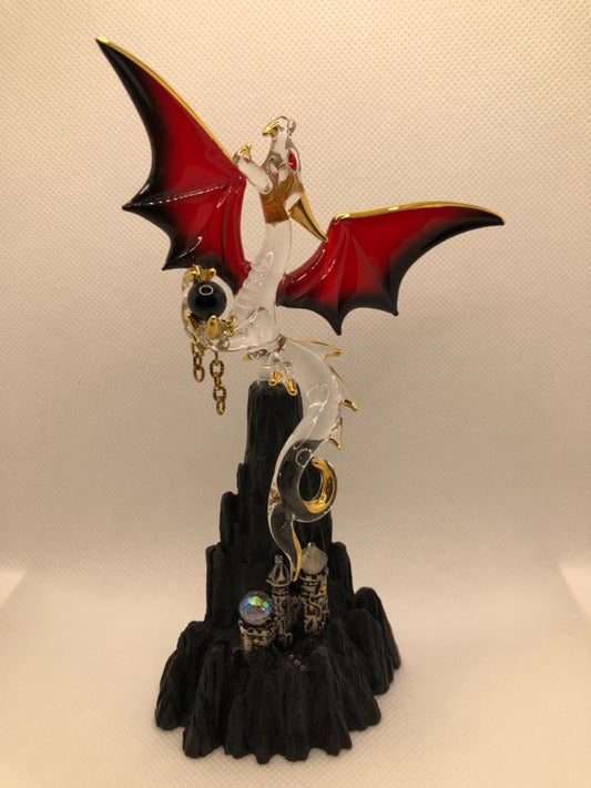 Handcrafted glass dragon perched on mountain fantasy décor