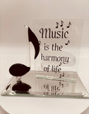 Handcrafted glass music note on beveled mirror base with “Music is the harmony of life” message and crystal accents