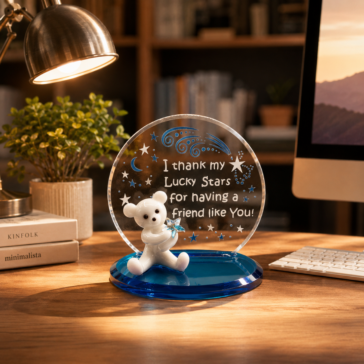 Handcrafted white glass teddy bear figurine holding a blue crystal star with friendship plaque reading "I thank my Lucky Stars for having a Friend like You" on a blue glass base.