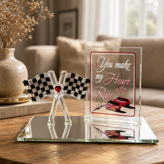 Handcrafted glass checkered flag figurine with red crystal heart on beveled mirror base and racing-themed decorative backplate
