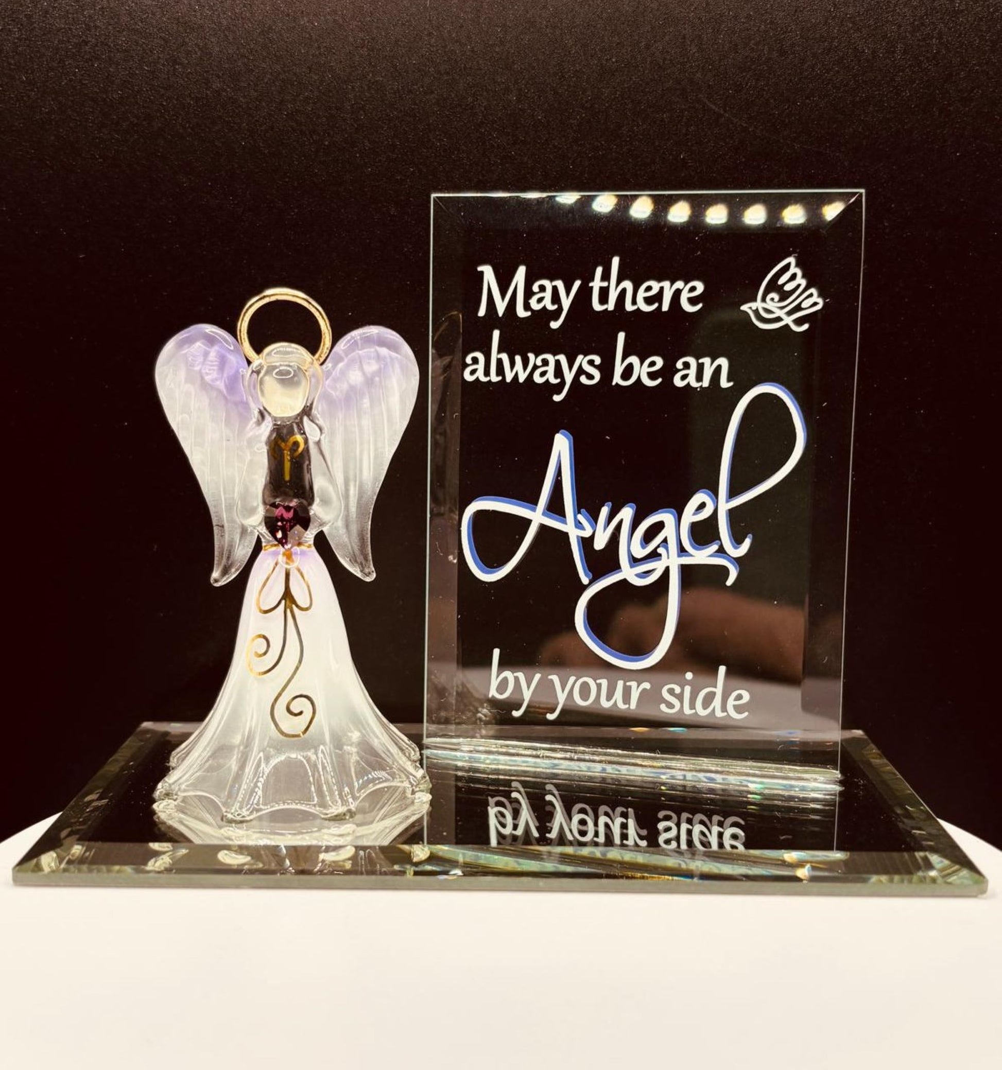 Handcrafted glass angel figurine holding purple crystal heart with Angel By Your Side message on mirror base