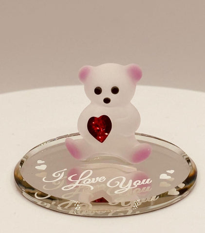 andcrafted glass bear figurine holding a crystal heart on a beveled mirror base with “I Love You” message