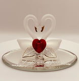 Handcrafted swan pair glass figurine with heart-shaped crystal on beveled mirror base and “I Love You” message