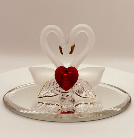 Handcrafted swan pair glass figurine with heart-shaped crystal on beveled mirror base and “I Love You” message