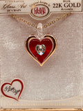 Red heart pendant necklace with crystal center and 22k gold trim on 18-inch chain