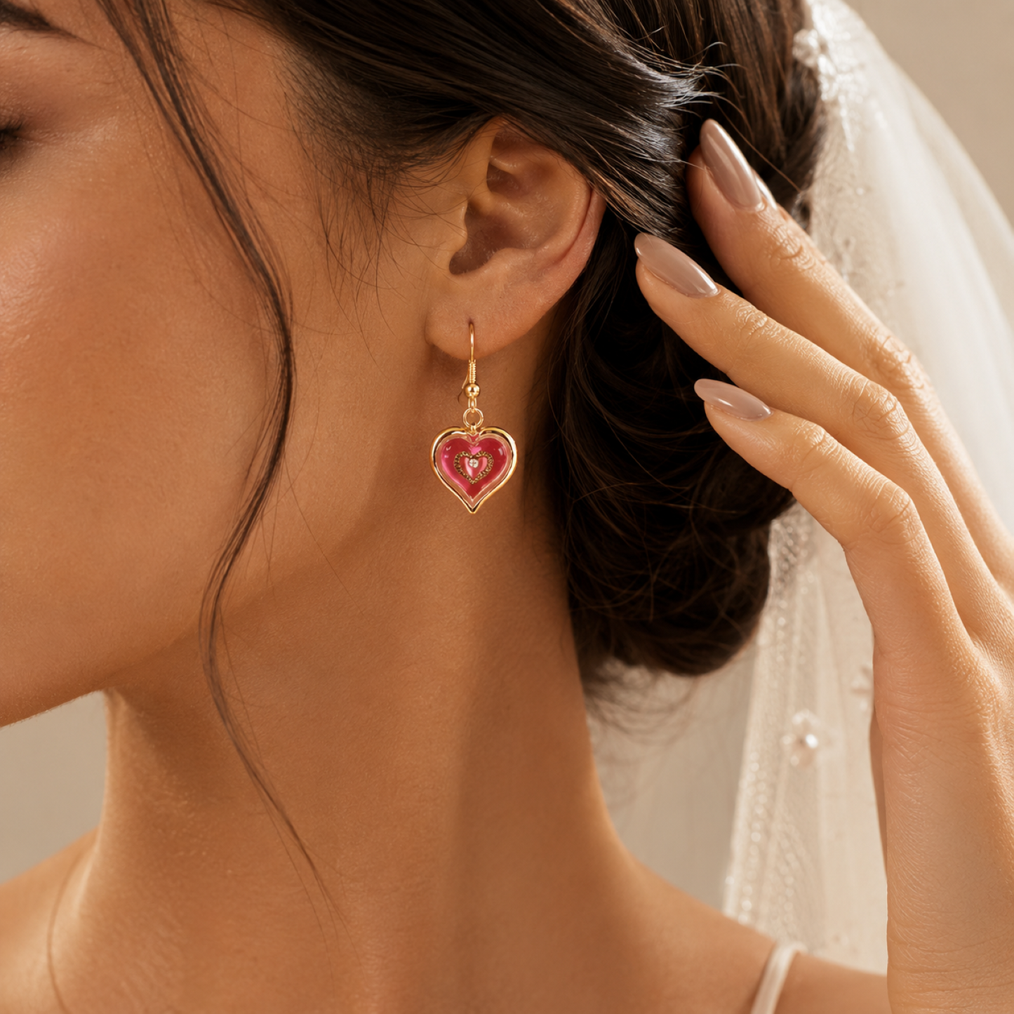 Handcrafted pink heart drop earrings with Genuine Crystals, Real 22Kt Gold trim, and fish hook ear wires.