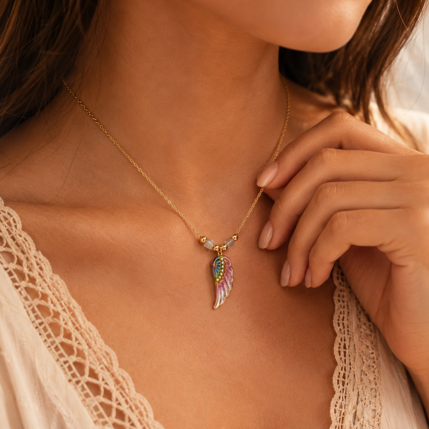 Rainbow angel wing pendant necklace with crystal accents on gold plated chain