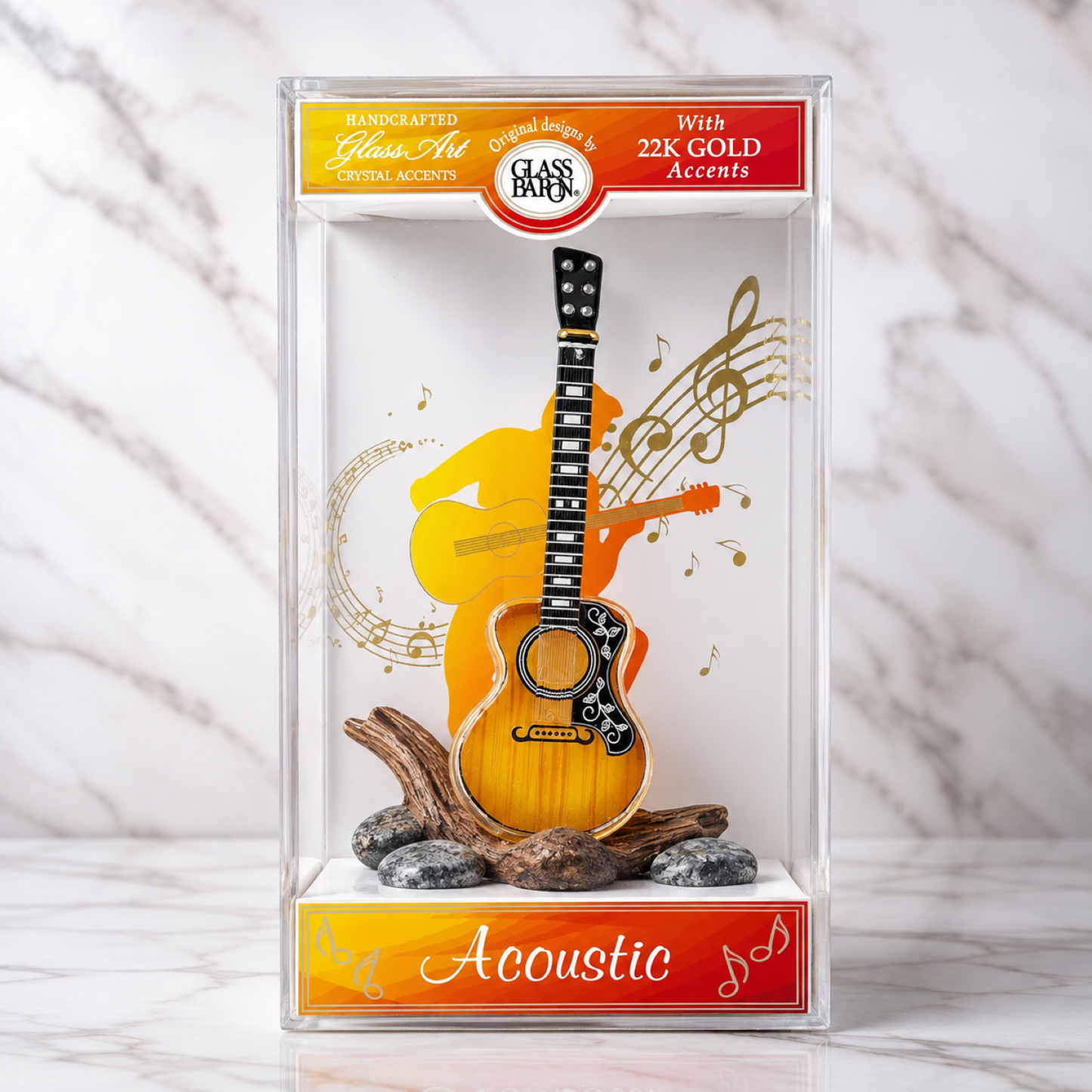 Handcrafted glass acoustic guitar figurine displayed in a clear gift box with music-themed artwork