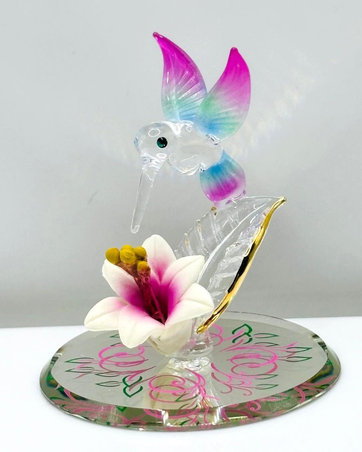 hummingbird glass figurine with multicolor wings over pink lily on mirror base bird decor gift