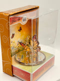 Handcrafted glass Monarch Butterfly figurine with vivid orange and black details in a keepsake display box