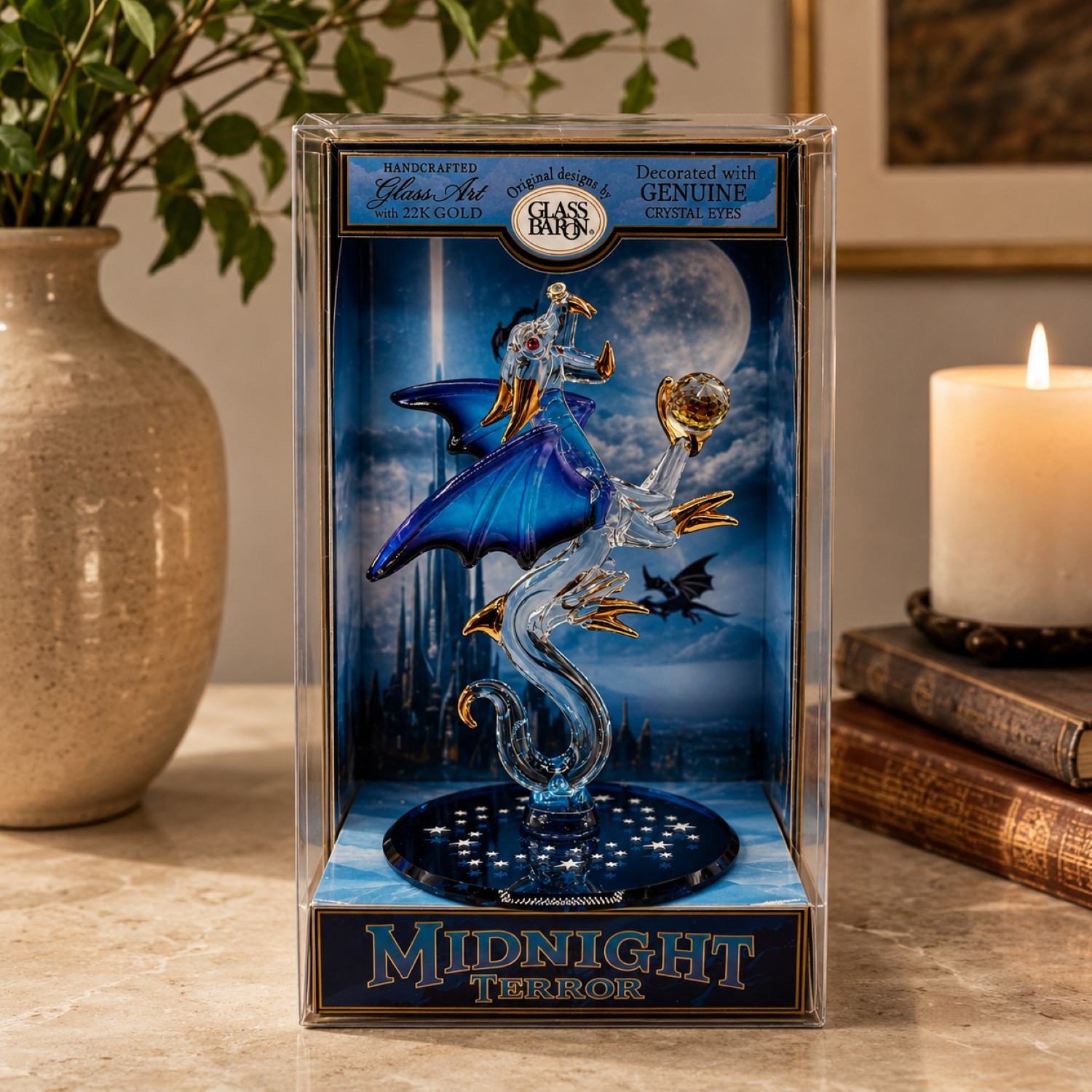 Handcrafted blue and clear glass dragon figurine with Genuine Crystal eyes and Real 22K Gold accents displayed inside a keepsake box.