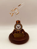 Handcrafted U.S. Navy F-18 jet glass figurine mounted on a decorative base with “U.S. Navy Veteran” metal plaque and gold accents