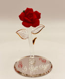 Handcrafted red glass rose on beveled mirror base with 22Kt gold accents and “I Love You” sentiment