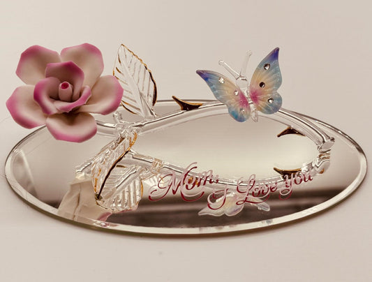 Handcrafted glass butterfly on pink rose with “Mom, I Love You” message on beveled mirror base