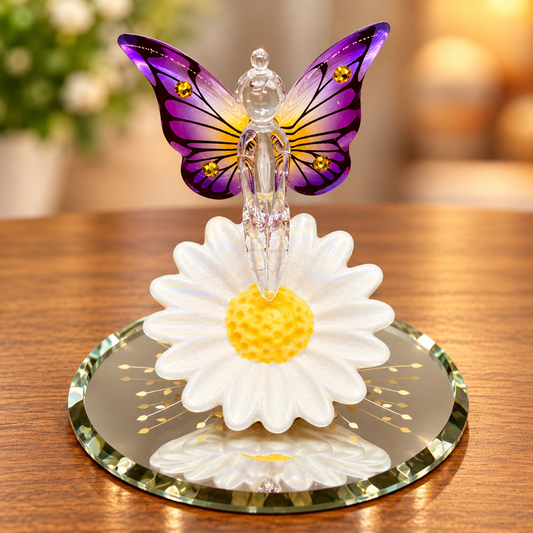 Handcrafted glass fairy figurine with purple butterfly wings on a white daisy with Genuine Crystals on a beveled glass mirror