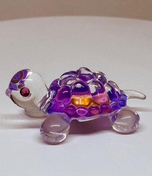 Handcrafted pink glass turtle figurine with crystal details
