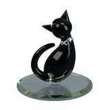 Handcrafted black cat glass figurine mounted on beveled mirror base
