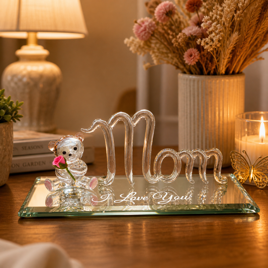 Handcrafted bear figurine holding flower next to 3D Mom design on beveled glass mirror with I Love You message