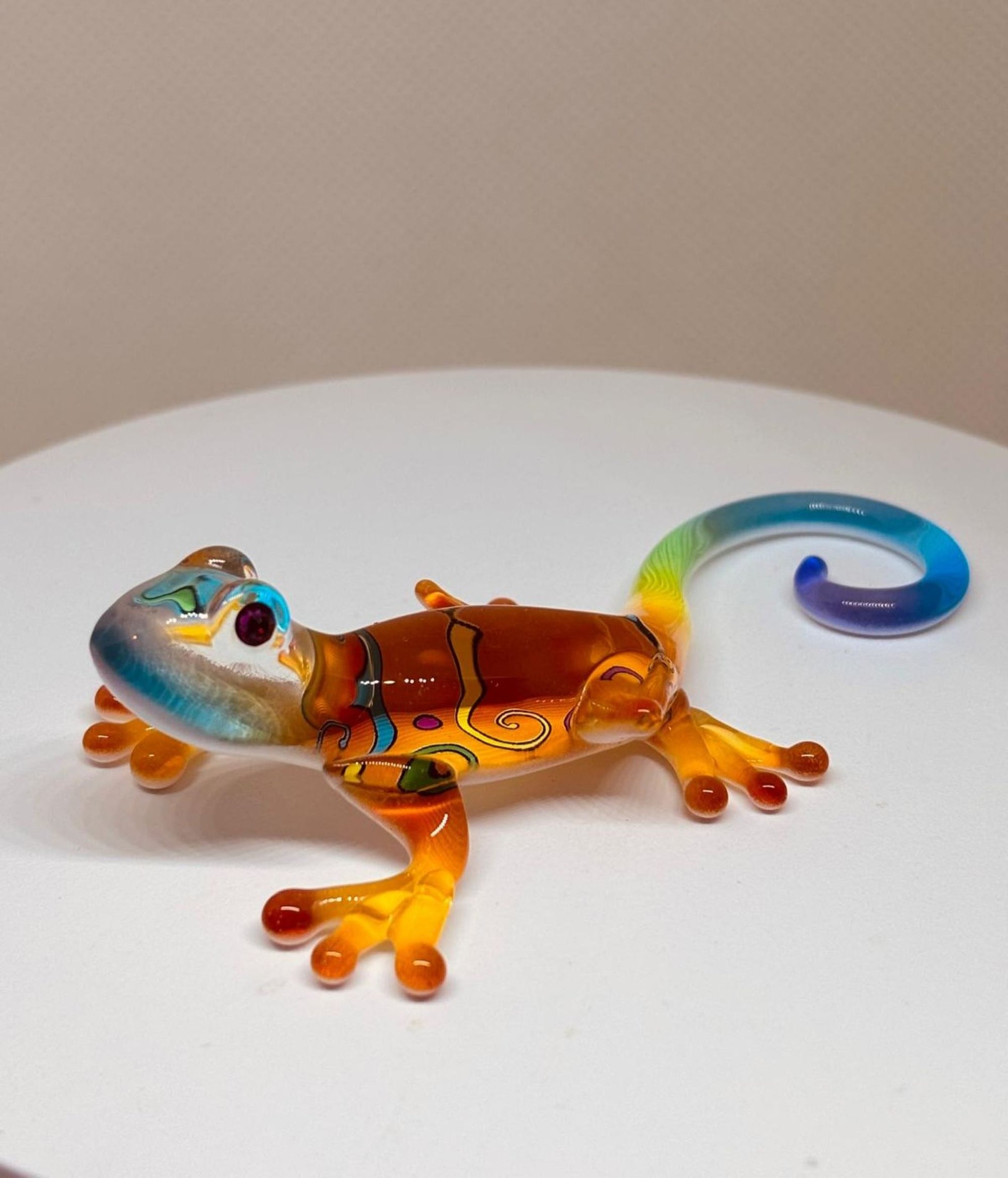 Handcrafted colorful Kona gecko figurine accented with genuine crystals and air brushing