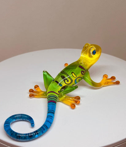 Handcrafted Maui gecko glass figurine in yellow, green, and blue with crystal accents