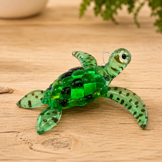 Handcrafted glass sea turtle figurine with embossed color, crystal accents and air-brushed details
