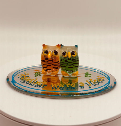 Handcrafted glass owl pair figurine on a beveled mirror base with “Together we’re a hoot” message