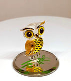 Handcrafted Big Barn Owl glass figurine with yellow eyes on mirrored base