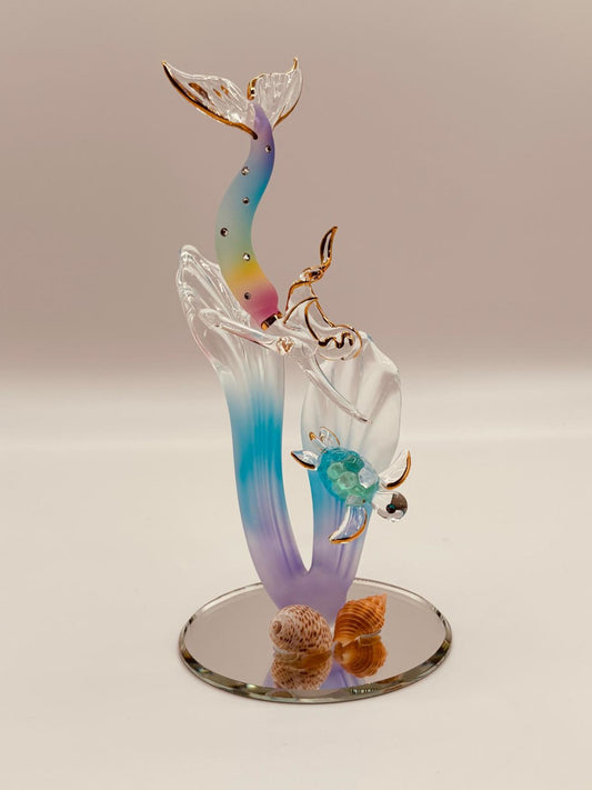 Handcrafted glass mermaid and turtle swimming among sea grass on a beveled mirror base with crystal and gold accents
