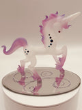 Handcrafted frosted glass unicorn on beveled mirror base with crystal accents