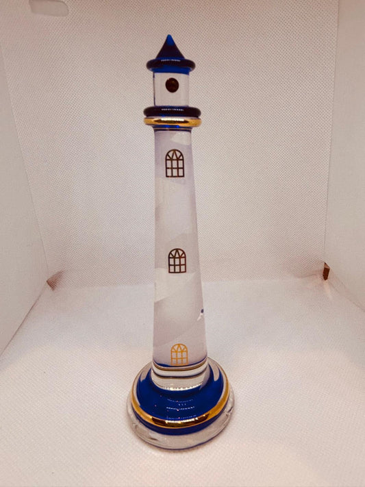 Handcrafted tall blue lighthouse glass figurine with etched spiral, cobalt accents, crystals, and gold trim