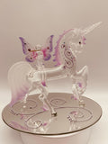 Handcrafted glass unicorn with airbrushed purple fairy on beveled mirror base accented with crystals