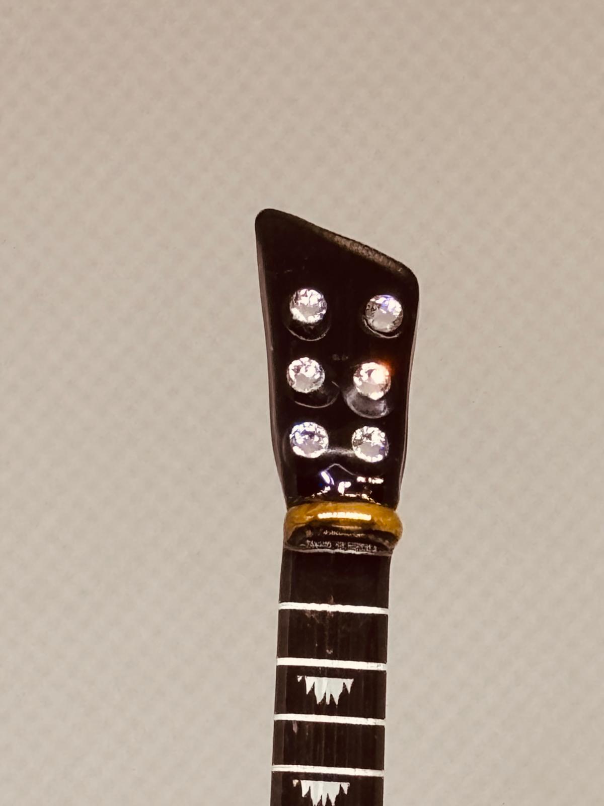 Smokin’ Hot Guitar Figurine Handcrafted Music Decor Gift