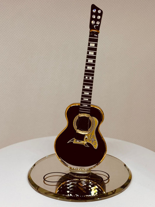 Handcrafted acoustic black guitar figurine with crystal accents and gold detailing