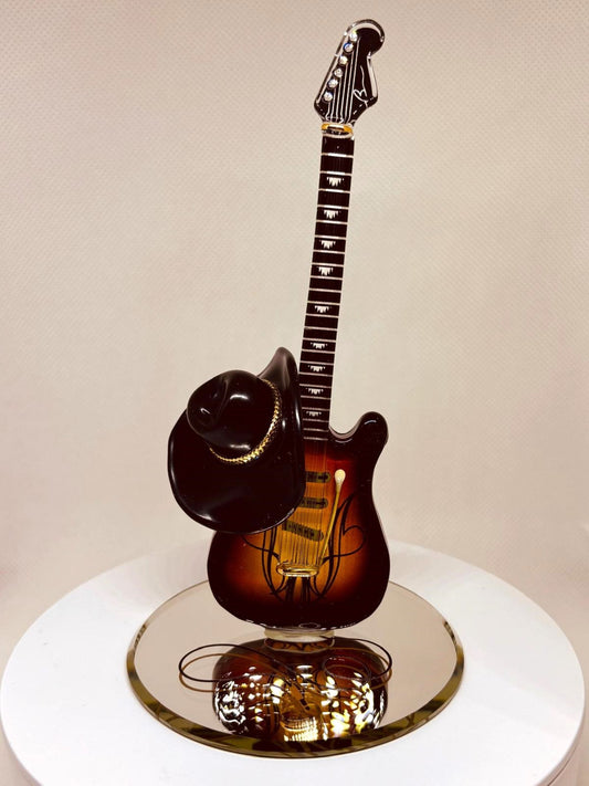 Handcrafted country guitar figurine with black hat detail and crystal accents