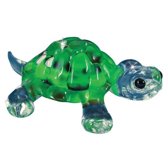 Handcrafted green glass sea turtle figurine with black shell accents