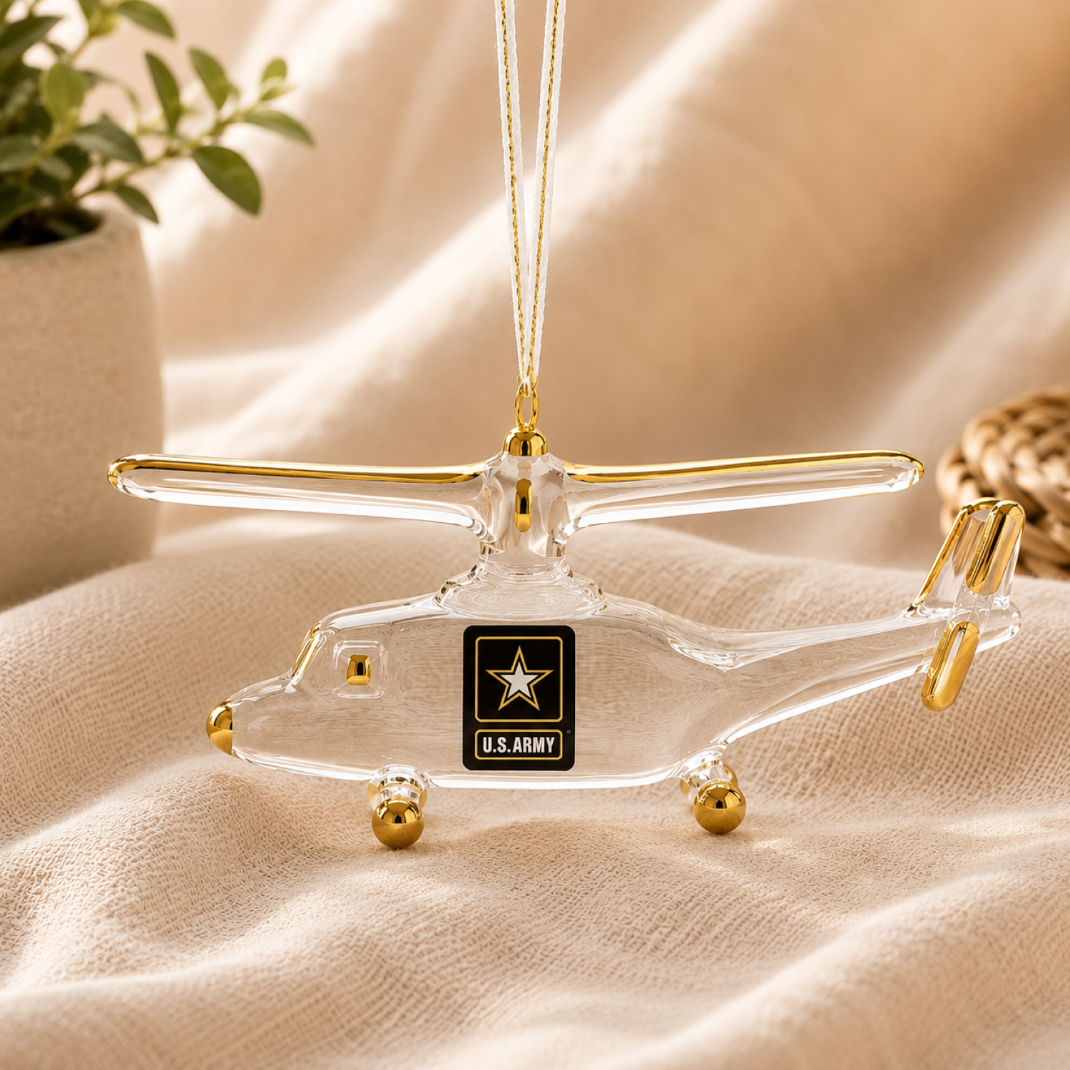 Official U.S. Army helicopter handcrafted glass Christmas ornament with U.S. Army emblem, Real 22Kt Gold accents, and gold hanging ribbon.