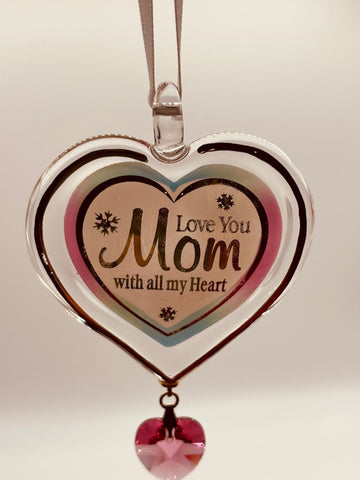 Handcrafted heart ornament on white ribbon with crystals and 22Kt gold featuring “Love You Mom” message