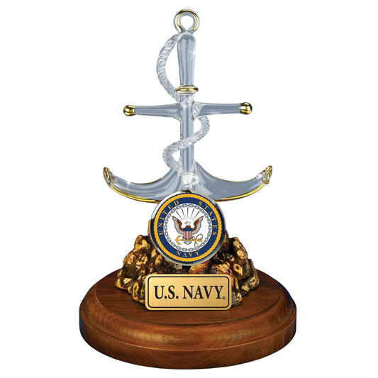 Handcrafted U.S. Navy glass anchor figurine with gold accents mounted on decorative wooden base with official Navy emblem and embossed plaque.